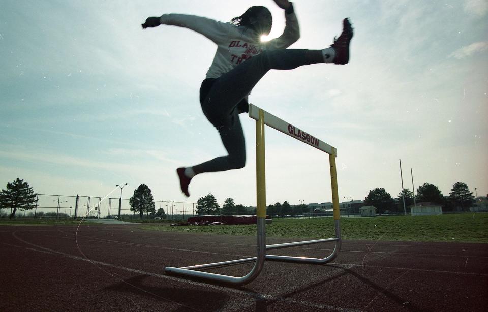 Glasgow's Kamilah Salaam clears a hurdle at practice. Salaam won the 2002 outdoor track and field state MVP award.