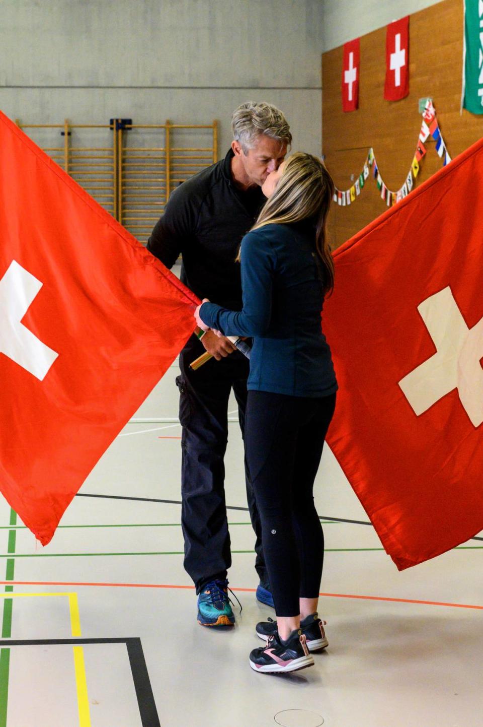 “Ready to Restart the Race” – Host Phil Keoghan gathers the teams in Switzerland to restart the Race nearly 20 months after production was suspended for the pandemic, and the longest pit stop in the show’s history, on THE AMAZING RACE, Wednesday, Jan. 19 (9:00-10:00 PM, ET/PT) on the CBS Television Network, and available to stream live and on demand on Paramount+*. Pictured L-R: Penn and Kim Holderness Photo: Helmut Wechter/CBS ©2021 CBS Broadcasting, Inc. All Rights Reserved.