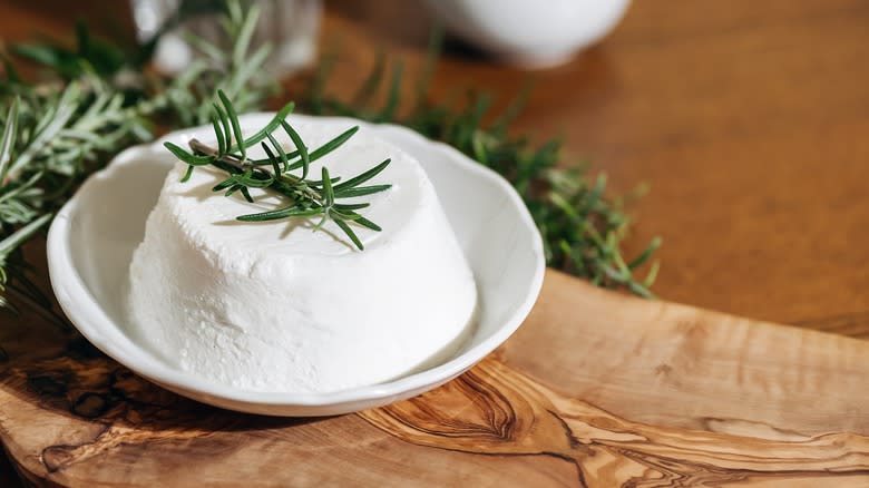 Ricotta on a plate with rosemary