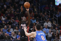 Miami Heat guard Kendrick Nunn (25) shoots over Oklahoma City Thunder forward Danilo Gallinari (8) in the first half of an NBA basketball game Friday, Jan. 17, 2020, in Oklahoma City. (AP Photo/Sue Ogrocki)