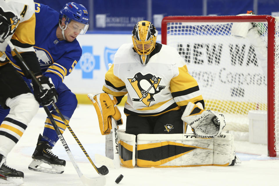 Buffalo Sabres forward Jeff Skinner (53) is stopped by Pittsburgh Penguins goalie Casey DeSmith (1) during the first period of an NHL hockey game, Sunday, April 18, 2021, in Buffalo, N.Y. (AP Photo/Jeffrey T. Barnes)