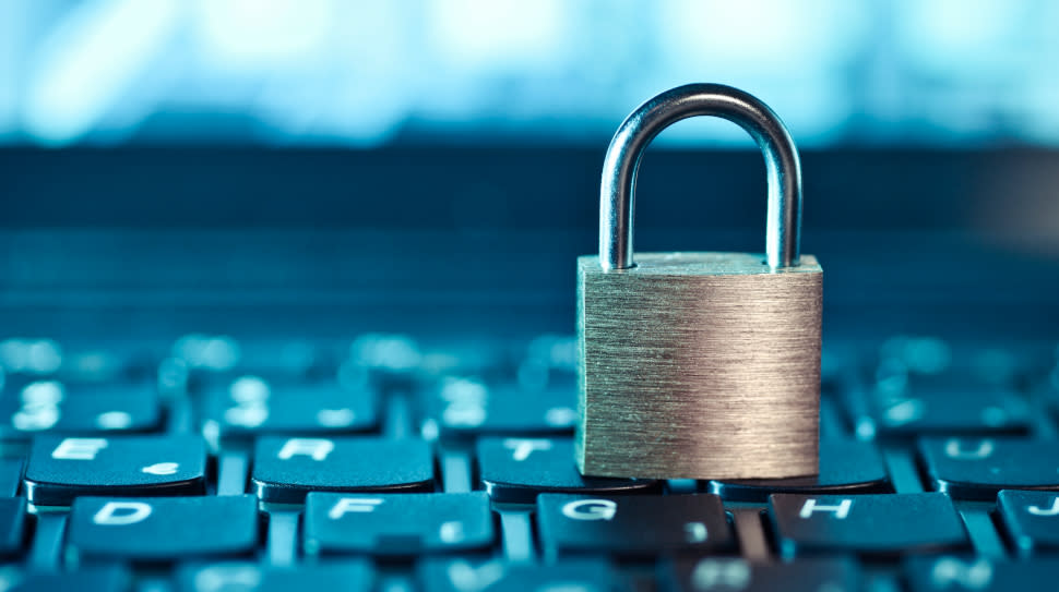  A padlock resting on a keyboard. 