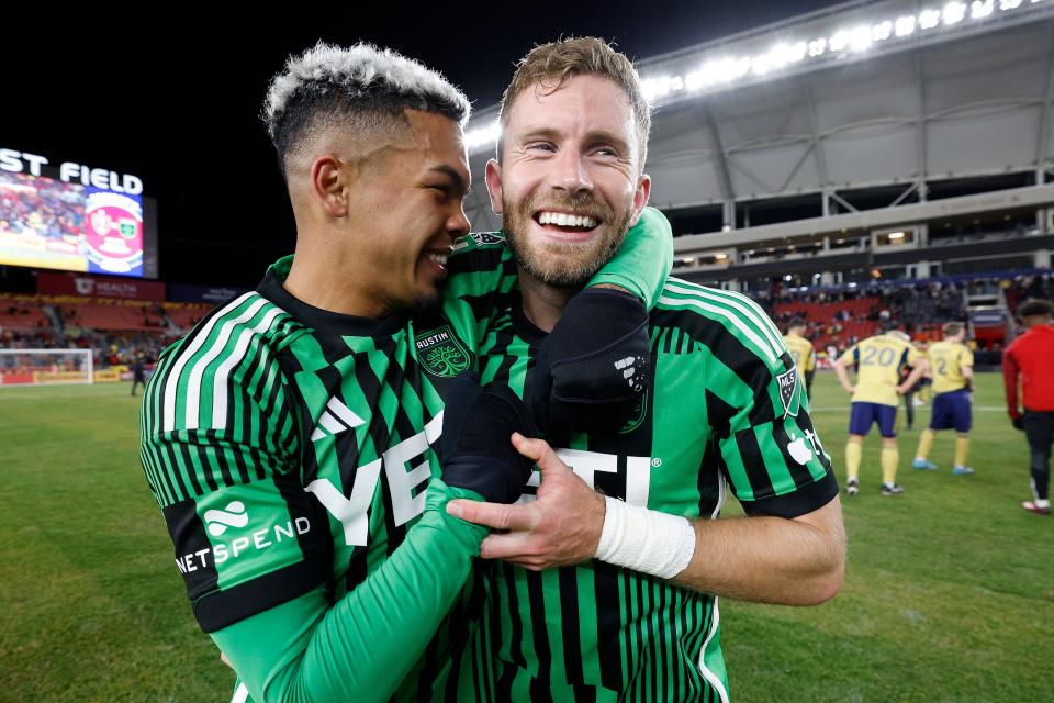 Austin FC midfielder Daniel Pereira, left, hugs forward Jon Gallagher after their win over Real Salt Lake in March.  Gallagher has been named to the MLS all-star team.