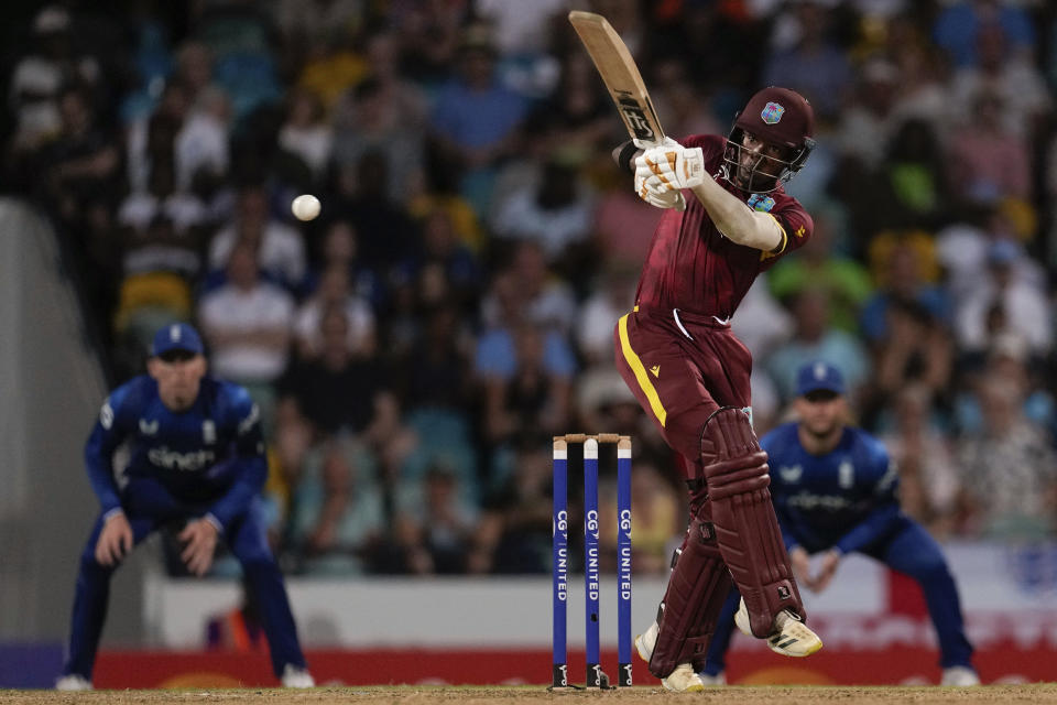 West Indies' Alick Athanaze plays a shot against England during the third ODI cricket match at Kensington Oval in Bridgetown, Barbados, Saturday, Dec. 9, 2023. (AP Photo/Ricardo Mazalan)