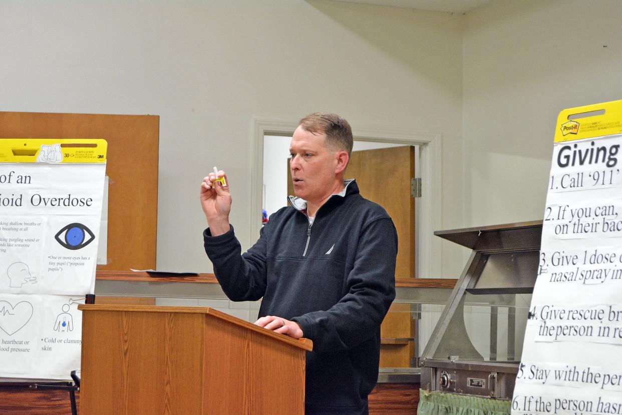 Dave Zellmer, health educator with Columbia/Boone County Public Health and Human Services, demonstrates Thursday the usage of Narcan, generic name Nalaxone, for use in treatment of those experiencing an opioid overdose. 