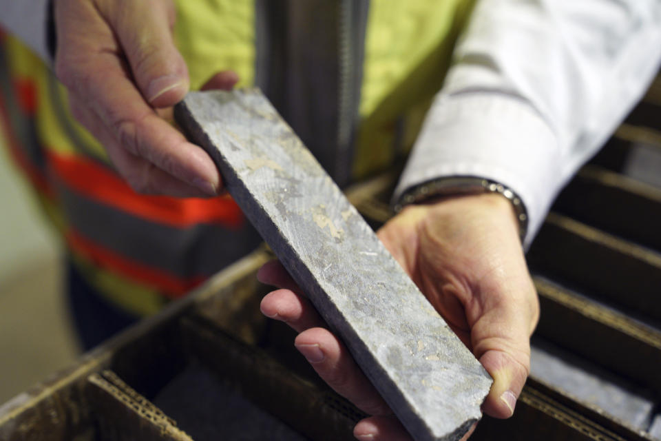 In this Wednesday, May 29, 2019 photo, core samples show the mineral deposits sought after by miners at the site of the Polymet copper-nickel mine in Hoyt Lakes, Minn. The developers of the proposed mine in northern Minnesota are courting bankers for nearly $1 billion to move ahead with the project, even as opponents hold out hope of blocking the operation due to fears of water pollution. (Anthony Souffle/Star Tribune via AP)