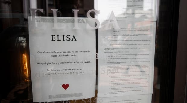 A letter posted on the door of Elisa steak house from Vancouver Coastal Health outlines the reasons the restaurant was issued a closure notice.