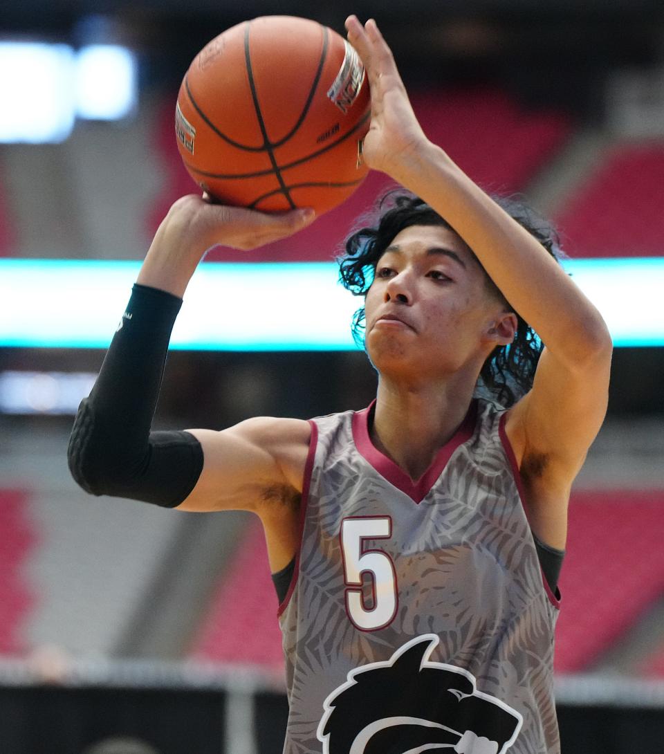 June 17, 2022; Glendale, Arizona; USA; Desert Mountain's Kaden House (5) shoots against Canyon during a game in the Section 7 basketball tournament at State Farm Stadium. Mandatory Credit: Patrick Breen-Arizona Republic