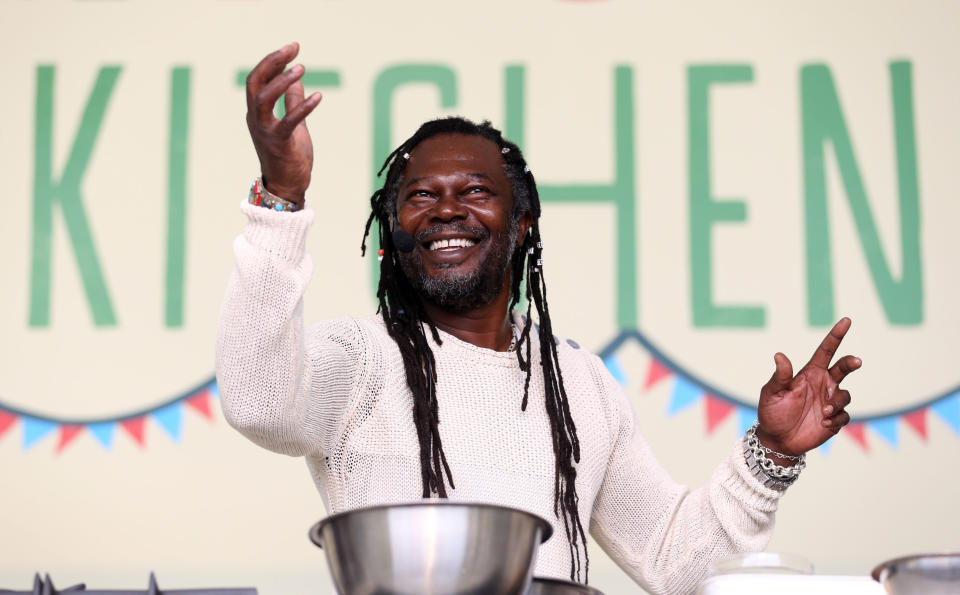 Levi Roots performs during a cooking demonstration at the Big Feastival held on the farm of Blur bassist Alex James' at Kingham in the Cotswalds.