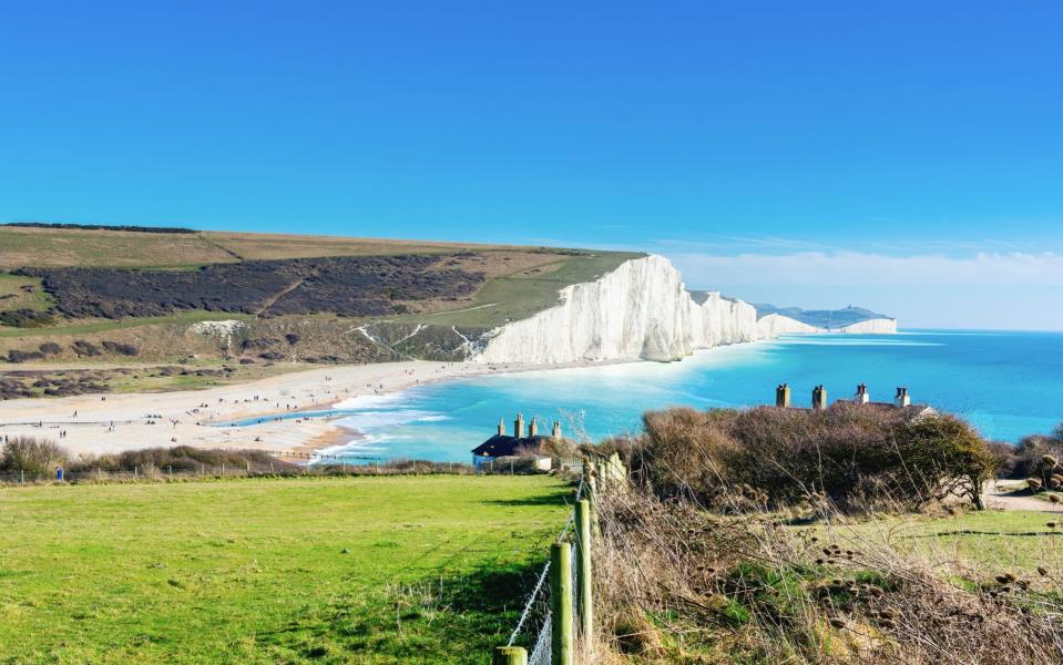 Spy the picture-book Coastguard Cottages by Cuckmere Haven  - Getty