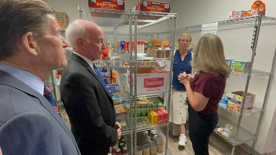 Veteran's Rally Point Food Coordinator Tammy Stott, right, shows U.S. Sen. Richard Blumenthal, U.S. Rep. Joe Courtney and State Sen. Cathy Osten the nonprofit's food pantry Wednesday.