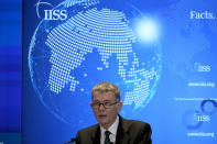 Richard Moore, the Chief of Britain's Secret Intelligence Service, also known as MI6, gives his first public speech since becoming head of the organisation, at the International Institute for Strategic Studies, in London, Tuesday, Nov. 30, 2021. China, Russia and Iran pose three of the biggest threats to the U.K. in a fast-changing, unstable world, the head of Britain's foreign intelligence agency said Tuesday. (AP Photo/Matt Dunham)