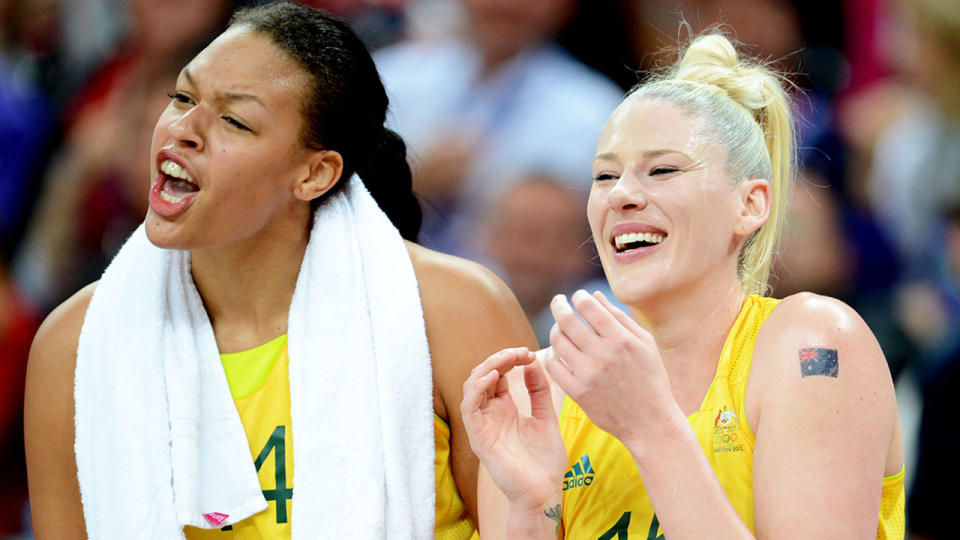 Former Opals teammate Liz Cambage and Lauren Jackson are pictured together on the side of the court.