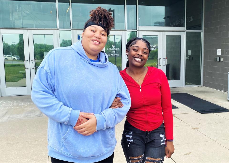 John'Eisha Logan, 17, and Jearlissia Jackson, 17, pose Monday in front of Battle High School. Both took part in the school's Spartan Academy and Jearlissia is graduating Saturday. John'Eisha is a junior at Battle.