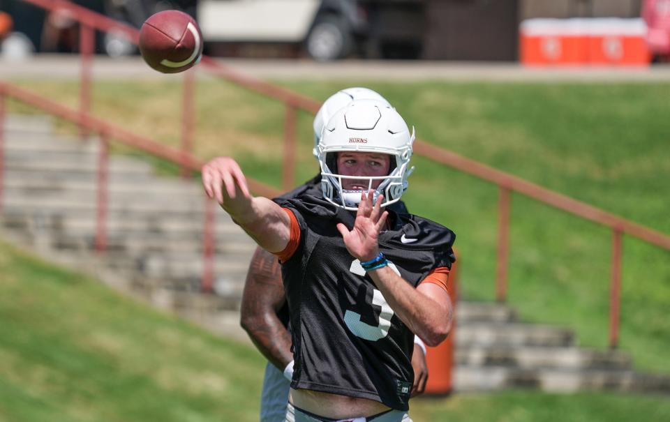 Texas quarterback Quinn Ewers passes the ball during the first preseason practices at the Frank Denius Fields on the University of Texas campus Wednesday. "Quinn played really, really well (today)," head coach Steve Sarkisian said. "One of the better practices he's had since I've been here.”