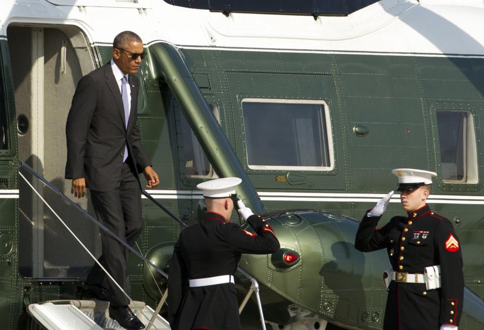 President Barack Obama steps off Marine One, upon his arrival at Andrews Air Force Base, Md in November. (Photo: Jose Luis Magana/AP)