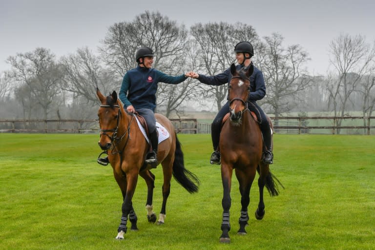 Harry Charles and Jack Whitaker aspired at one point to be a pilot and a footballer respectively but now their sights are set on emulating their famous fathers in winning show jumping medals at the 2024 Olympics. (AFP/Peter Nixon)