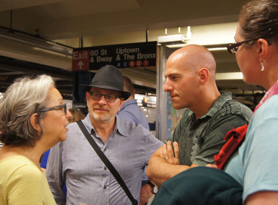 Rabbi Matalon (in hat) with Caleb Follett and other members of the exchange, at a subway stop in New York City.<span class="copyright">Amanda Ripley</span>