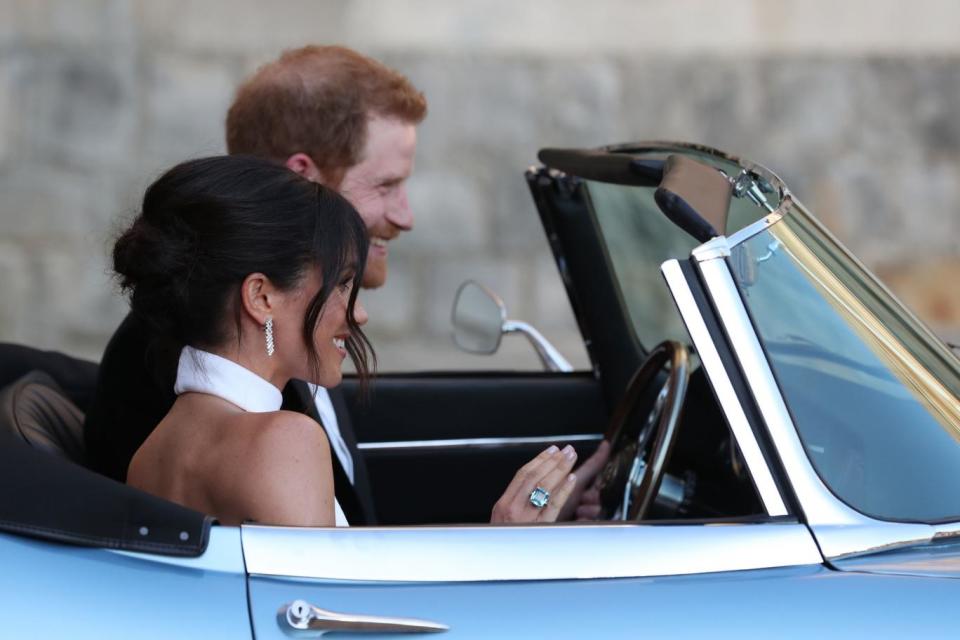 The ring was spotted as Meghan and Harry drove to their evening do (PA)