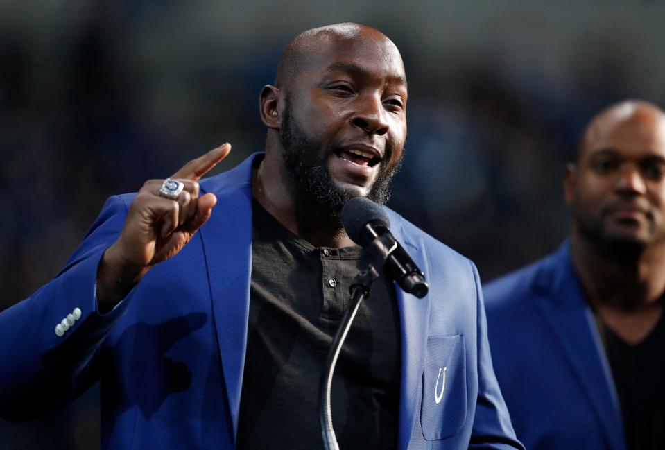 Robert Mathis speaks during his Ring of Honor induction ceremony Sunday, Nov. 28, 2021, during a game against the Tampa Bay Buccaneers at Lucas Oil Stadium in Indianapolis.