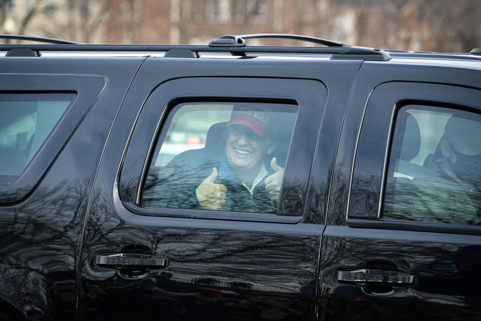 STERLING, VA - DECEMBER 13: U.S. President Donald Trump gives a thumbs up towards supporters as he departs Trump National Golf Club on December 13, 2020 in Sterling, Virginia. (Photo by Al Drago/Getty Images)