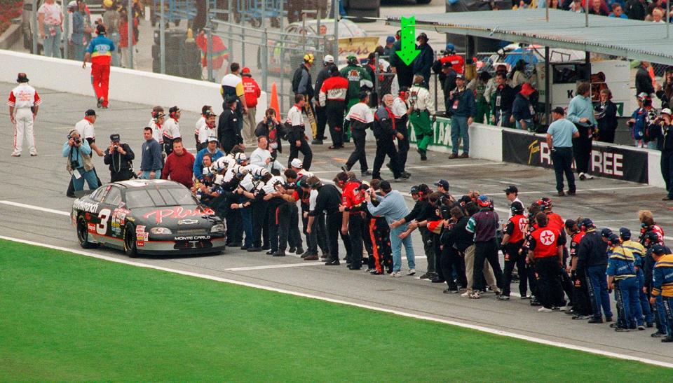 Pit crew members from other teams congratulated Dale Earnhardt on his way to Victory Lane after he won the 1998 Daytona 500.