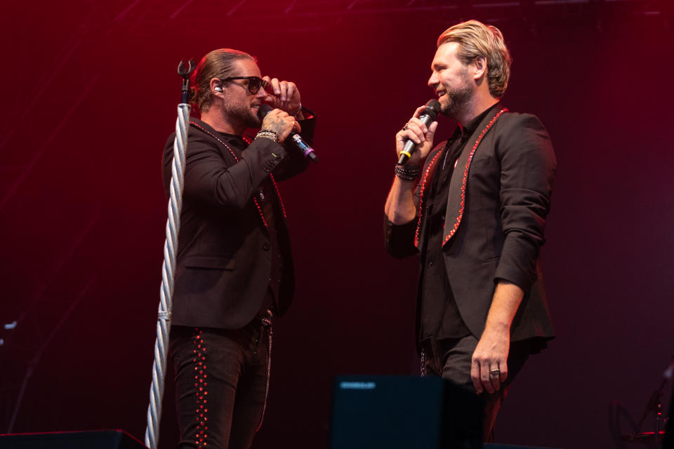 MALDON, ENGLAND - JULY 31: Keith Duffy and Brian McFadden of Boyzlife perform at Fantasia on July 31, 2021 in Maldon, England. (Photo by Lorne Thomson/Redferns)