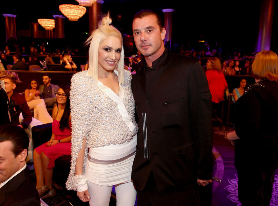 Gwen Stefani (L) and Gavin Rossdale attend the PEOPLE Magazine Awards at The Beverly Hilton Hotel on December 18, 2014 in Beverly Hills, California.