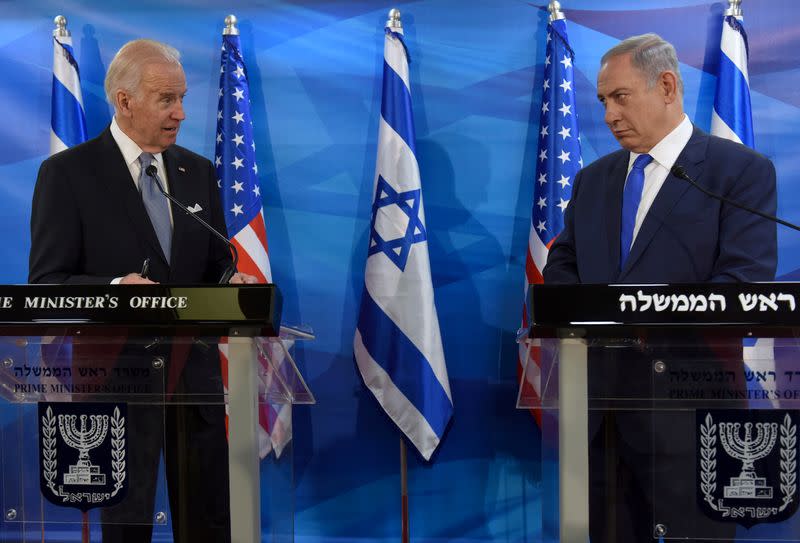 FILE PHOTO: U.S. Vice President Biden and Israeli Prime Minister Netanyahu look at each other as they deliver joint statements during their meeting in Jerusalem