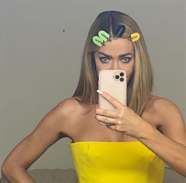 denise richards yellow dress selfie