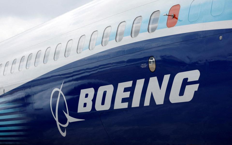 The Boeing logo on the side of a Boeing 737 Max at the Farnborough International Airshow in 2022