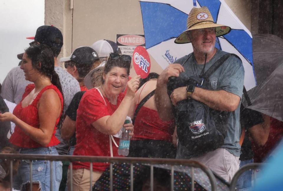 The rain didn’t stop Panthers fans as they huddled under shelter before the Stanley Cup victory parade at Fort Lauderdale Beach on Tuesday, June 30, 2024 in Fort Lauderdale. 