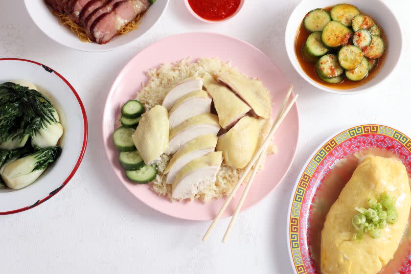 Los Angeles, CA - July 23: The Hainan Chicken plate is seen in the middle of an assortment of dishes at Pearl River Deli on Saturday, July 23, 2022 in Los Angeles, CA. The restaurant serves Cantonese-type food. (Dania Maxwell / Los Angeles Times)