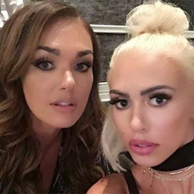 Petra Stunt shows off platinum blonde hair during an evening with her sister Tamara Ecclestone