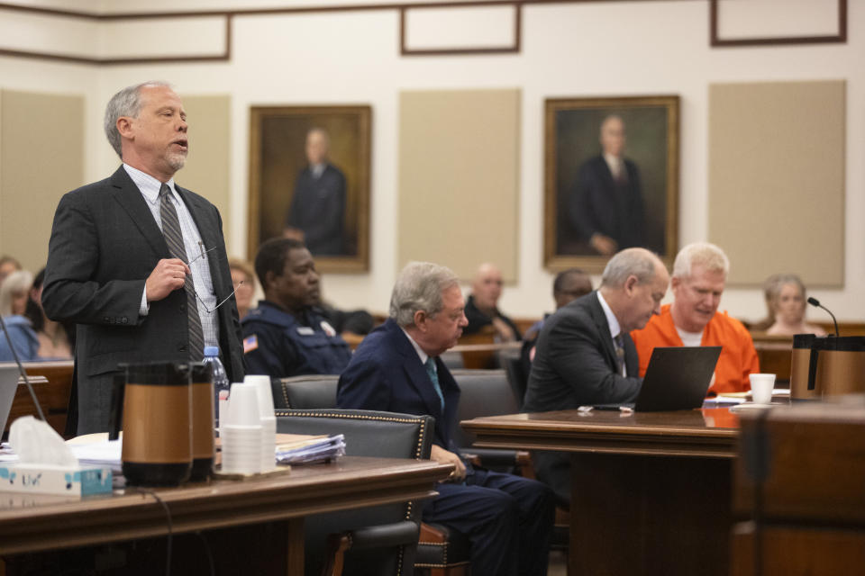 Prosecutor Creighton Waters, left, addresses the court during Alex Murdaugh's sentencing for stealing from 18 clients, Tuesday, Nov. 28, 2023, at the Beaufort County Courthouse in Beaufort, S.C. (Andrew J. Whitaker/The Post And Courier via AP, Pool)