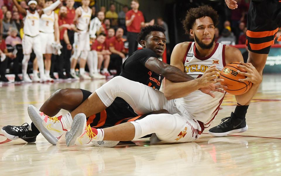Iowa State’s George Conditt, right, and Oregon State's Roman Silva battle for the ball during the first half of the Nov. 12 game at Hilton Coliseum in Ames.