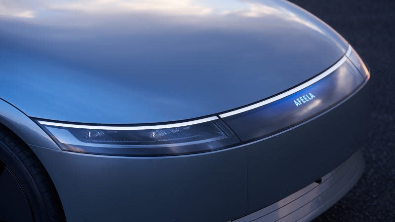 Close-up view of the Sony Honda Afeela concept's front light bar.