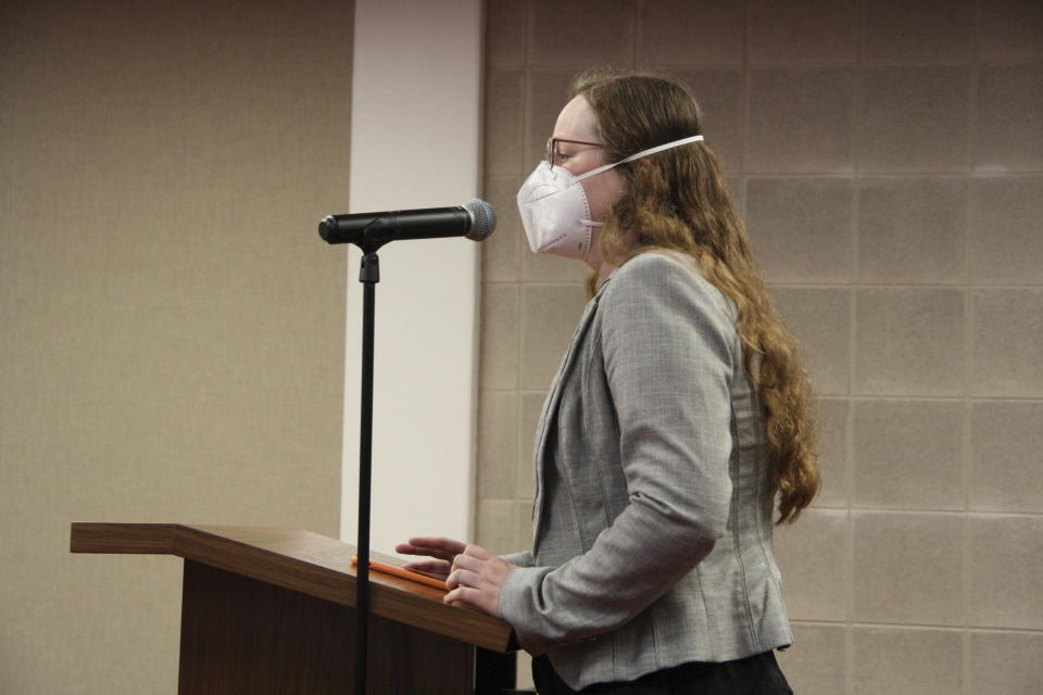 Simone Hetherington, a speaker during public comment, urges lawmakers not to pass the masking bill during the state Senate Rules Committee in the Legislative Building in Raleigh, N.C., Wednesday, May 15, 2024. Hetherington told lawmakers she is immunocompromised and is concerned how the bill would impact her ability to wear a mask in public. (AP Photo/Makiya Seminera)