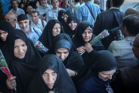 Iranian pilgrims wait at the Imam Khomeini Airport as they depart for the annual haj pilgrimage to the holy city of Mecca, in Tehran, Iran July 31, 2017. Nazanin Tabatabaee Yazdi /TIMA via REUTERS.