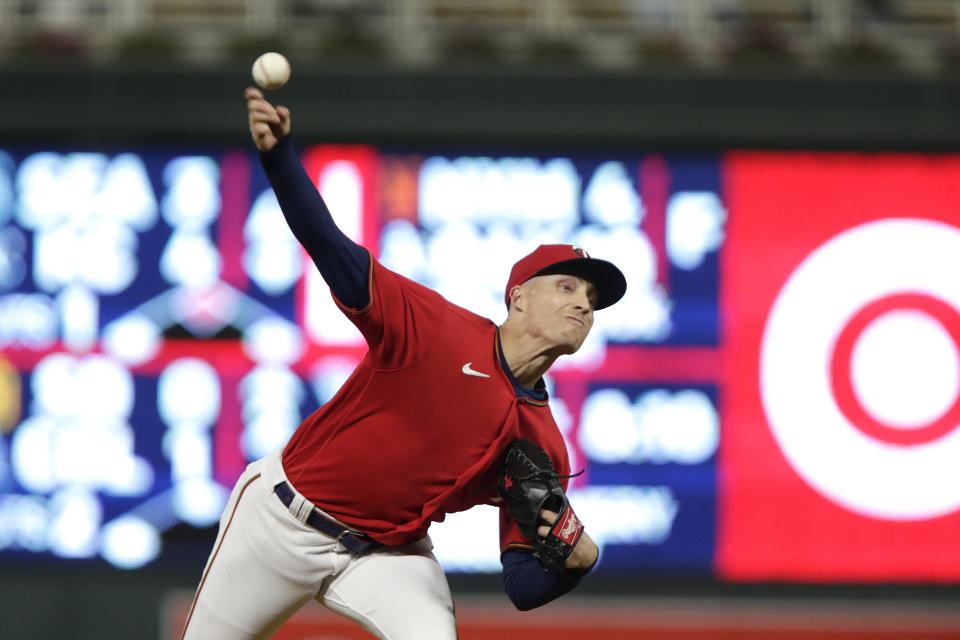 Minnesota Twins relief pitcher Griffin Jax throws to the Minnesota Twins in the fifth inning of a baseball game Saturday, Sept. 24, 2022, in Minneapolis. (AP Photo/Andy Clayton-King)