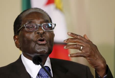 Zimbabwe's President Robert Mugabe speaks during a press briefing at the Union building in Pretoria, April 8, 2015. REUTERS/Siphiwe Sibeko