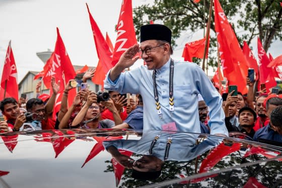 Anwar Ibrahim greets supporters on Nov. 5, 2022 in Tambun, Perak, Malaysia. <span class="copyright">Sadiq Asyraf—Getty Images</span>