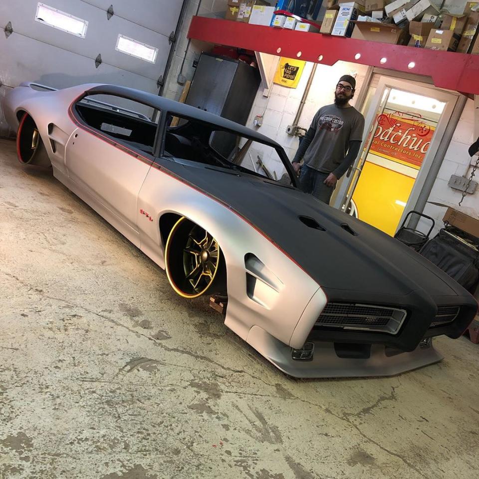 <img src="pontiac-gto-2.jpg" alt="A 1969 Pontiac GTO restomod bound for SEMA">