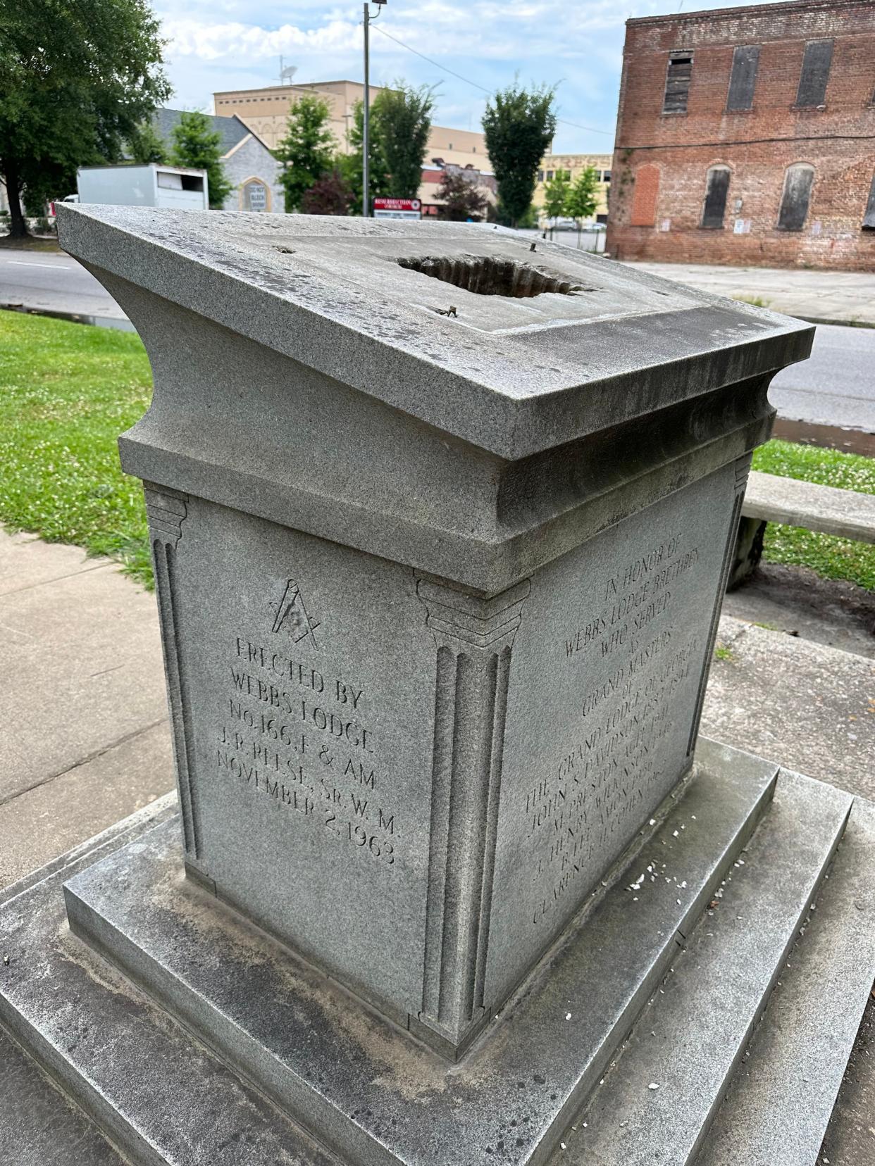 The bronze bible was stolen off of the Masonic Marker at Greene and 8th streets in Augusta.