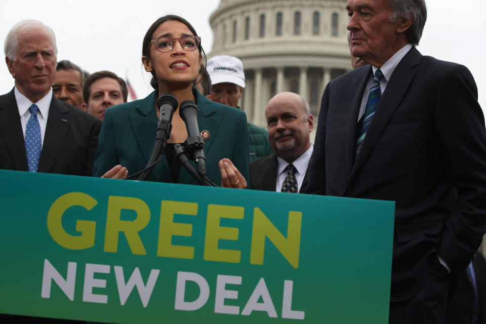Rep. Alexandria Ocasio-Cortez and Sen. Ed Markey (far right) unveil their resolution for a Green New Deal in Washington in February. (Photo: Alex Wong via Getty Images)