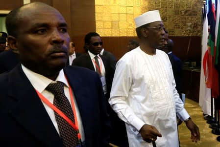 Chadian President Idriss Deby arrives for the signing of the Sudan's power sharing deal, in Khartoum