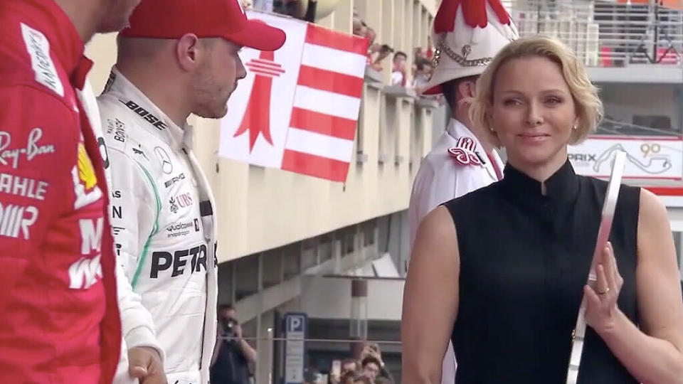 Princess Charlene offered up a wink on the podium, seemingly to race winner and Monaco resident Lewis Hamilton. Pic: F1