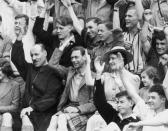 <p>King George VI and Queen Elizabeth sing a song at the King's Camp at Abergeldie Castle, with Princesses Margaret and Elizabeth. </p>