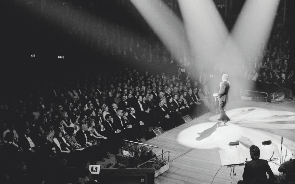 Ol’ Blue Eyes… Frank Sinatra performs to a packed hall in 1975 -  Terry O'Neill / Iconic Images