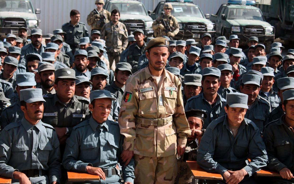 Afghan General Abdul Raziq  poses for a picture during a graduation ceremony at a police training centre in Kandahar province - AFP